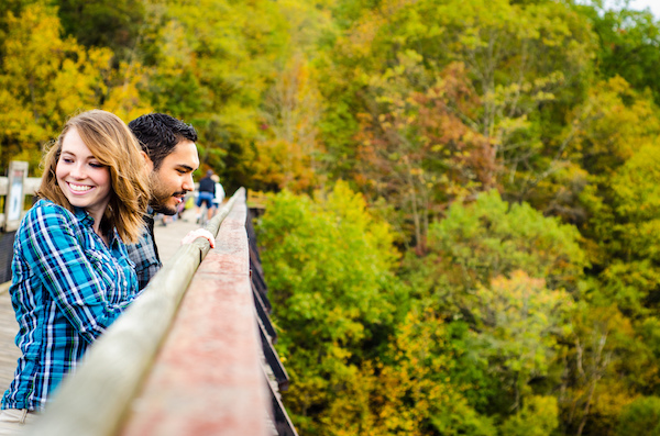couple looking over bridge flannel