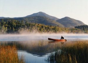 Adirondacks canoe on lake