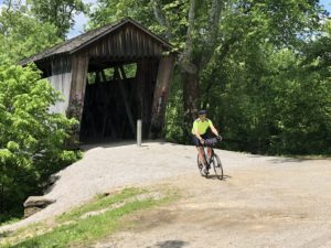Kentucky biker and covered bridge