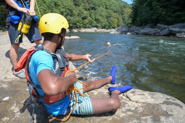 Scouts white water merit badge rope throwing.