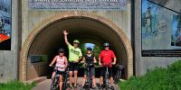 Cyclists Bike Touring the Great Allegheny Passage bike trail and passing through the Eastern Continental Divide with Wilderness Voyageurs Bike Tours