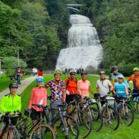 waterfall and cyclists